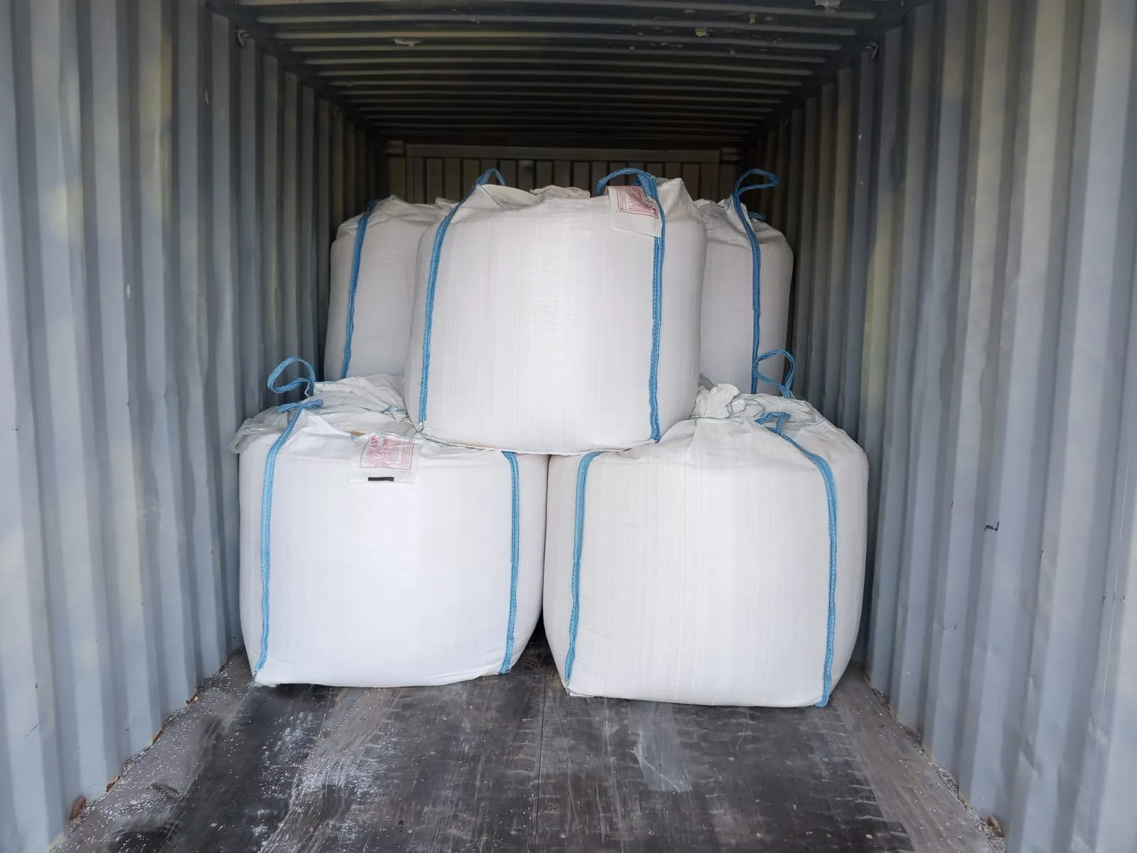 Bulk bags prepared inside a shipping container