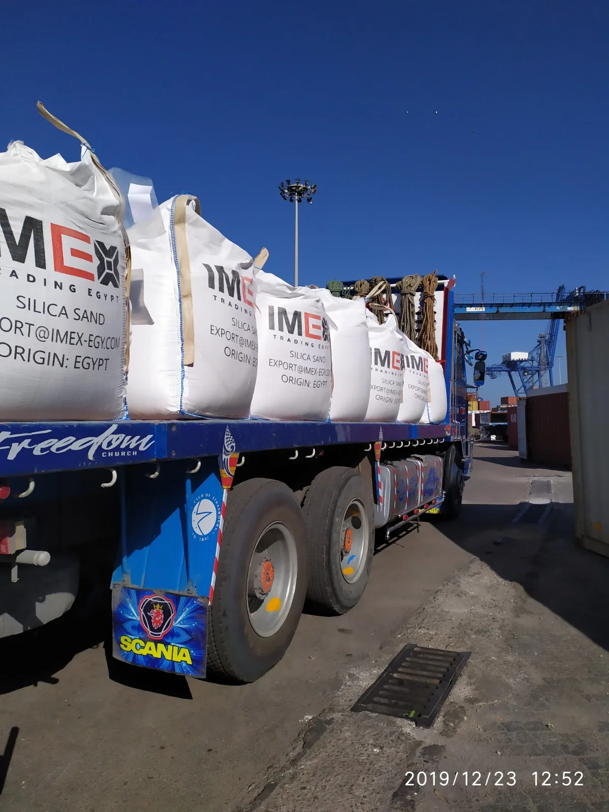 Packaged IMEX mineral cargo being prepared for transport