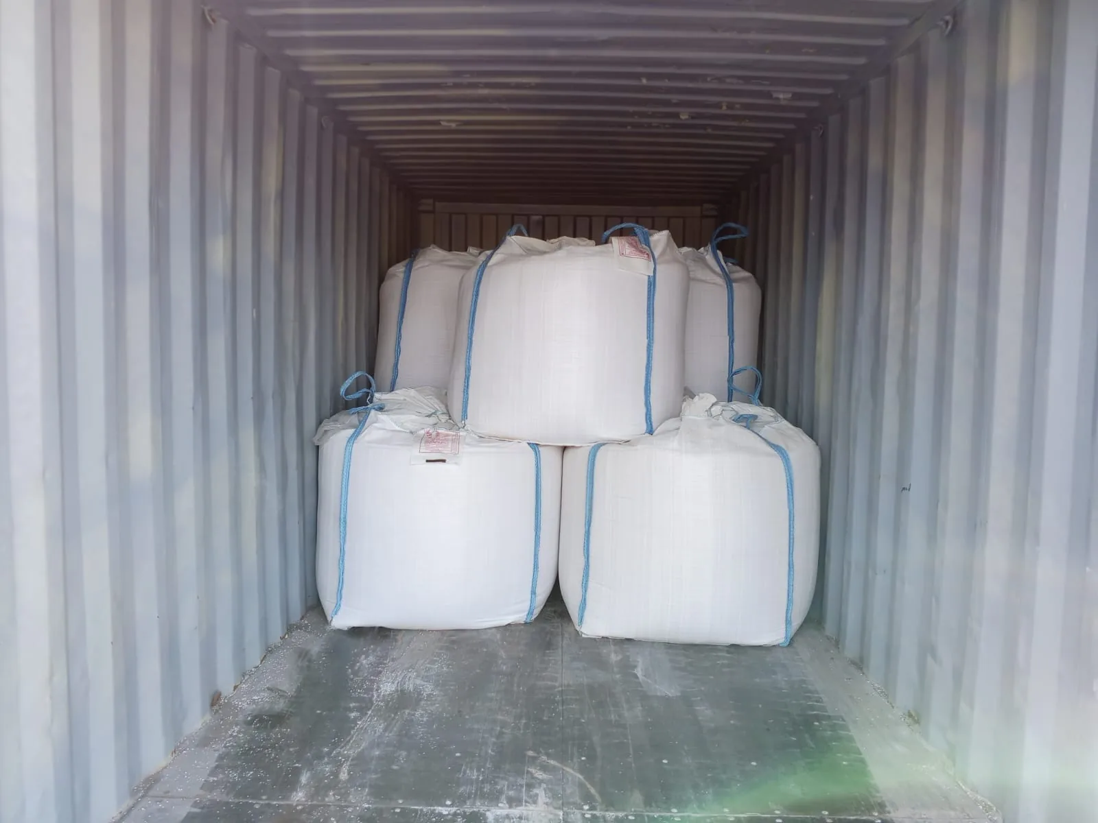 Shipping container packed with mineral bulk bags
